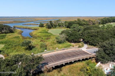 A new fortified (2025) roof and new top floor outdoor decking on The Currituck Golf Club in North Carolina - for sale on GolfHomes.com, golf home, golf lot