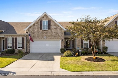 Start living your best life at the coast! This low-maintenance on Crow Creek Golf Club in North Carolina - for sale on GolfHomes.com, golf home, golf lot