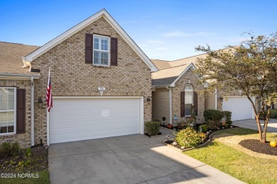 Start living your best life at the coast! This low-maintenance on Crow Creek Golf Club in North Carolina - for sale on GolfHomes.com, golf home, golf lot