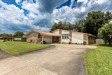 Step into this stunning, contemporary home crafted in 1972 on Fort Walton Beach Golf Course in Florida - for sale on GolfHomes.com, golf home, golf lot