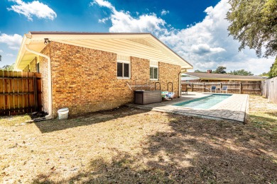 Step into this stunning, contemporary home crafted in 1972 on Fort Walton Beach Golf Course in Florida - for sale on GolfHomes.com, golf home, golf lot