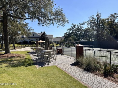 Enjoy this stunning and stylishly updated home with main on Callawassie Island Club in South Carolina - for sale on GolfHomes.com, golf home, golf lot