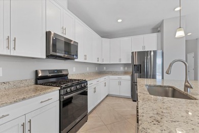 Don't miss this rare chance to own a move-in ready jewel in the on Esplanade Golf and Country at Lakewood Ranch in Florida - for sale on GolfHomes.com, golf home, golf lot