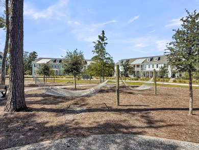 Discover elegance and modern comfort in this beautifully on Dunes West Golf Club in South Carolina - for sale on GolfHomes.com, golf home, golf lot