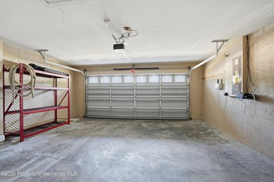 Beautiful four bedrooms, two bath l home with large pool and on Sugarmill Woods Golf and Country Club in Florida - for sale on GolfHomes.com, golf home, golf lot