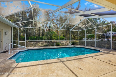 Beautiful four bedrooms, two bath l home with large pool and on Sugarmill Woods Golf and Country Club in Florida - for sale on GolfHomes.com, golf home, golf lot