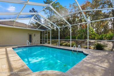 Beautiful four bedrooms, two bath l home with large pool and on Sugarmill Woods Golf and Country Club in Florida - for sale on GolfHomes.com, golf home, golf lot