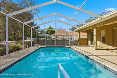 Beautiful four bedrooms, two bath l home with large pool and on Sugarmill Woods Golf and Country Club in Florida - for sale on GolfHomes.com, golf home, golf lot