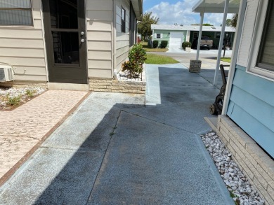 LIVE FREE FOR 1 YEAR, LOT RENT PAID SAVE $7260.00 GREAT DEAL !!! on Lake Henry Golf Club in Florida - for sale on GolfHomes.com, golf home, golf lot