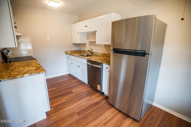 Adorable 2-bedroom, 1 full bathroom condo with plenty of light on Leisure Village East in New Jersey - for sale on GolfHomes.com, golf home, golf lot