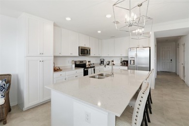 This exceptional second-floor residence is ready to welcome you on Lakewood National Golf Club in Florida - for sale on GolfHomes.com, golf home, golf lot