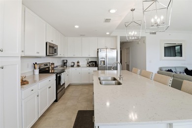 This exceptional second-floor residence is ready to welcome you on Lakewood National Golf Club in Florida - for sale on GolfHomes.com, golf home, golf lot