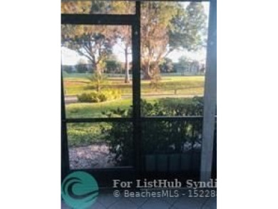 55+ adult community. *CONVENIENT 1ST FLOOR CORNER UNIT WITH on Woodlands Country Club in Florida - for sale on GolfHomes.com, golf home, golf lot