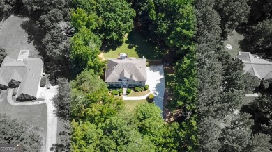 Welcome to Lake Dow North, where this 2 story,  4 bedroom, 3 on Canongate At Georgia National Golf Club in Georgia - for sale on GolfHomes.com, golf home, golf lot