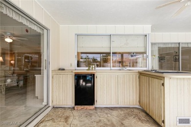 Welcome to this delightful single-family residence nestled in on Whiskey Creek Country Club in Florida - for sale on GolfHomes.com, golf home, golf lot