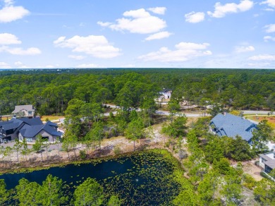 Located within the esteemed Wild Heron neighborhood, a new on Sharks Tooth Golf Club in Florida - for sale on GolfHomes.com, golf home, golf lot