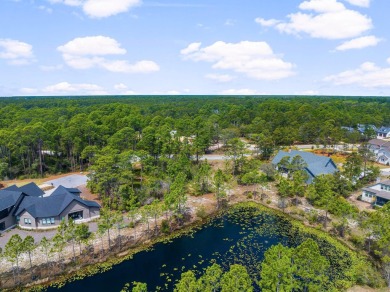Located within the esteemed Wild Heron neighborhood, a new on Sharks Tooth Golf Club in Florida - for sale on GolfHomes.com, golf home, golf lot