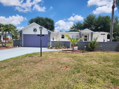 This beautiful 2-bedroom, 2-bath split-floor plan home is on Pine Lakes Country Club in Florida - for sale on GolfHomes.com, golf home, golf lot