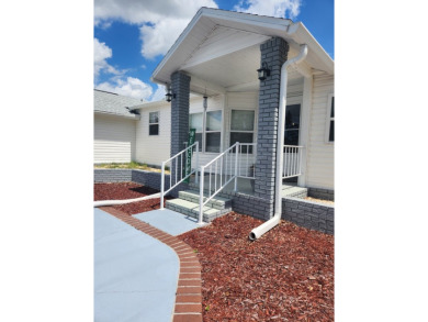 This beautiful 2-bedroom, 2-bath split-floor plan home is on Pine Lakes Country Club in Florida - for sale on GolfHomes.com, golf home, golf lot