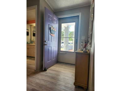 This beautiful 2-bedroom, 2-bath split-floor plan home is on Pine Lakes Country Club in Florida - for sale on GolfHomes.com, golf home, golf lot