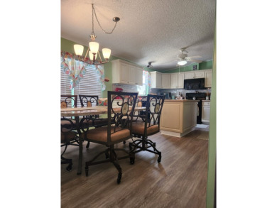 This beautiful 2-bedroom, 2-bath split-floor plan home is on Pine Lakes Country Club in Florida - for sale on GolfHomes.com, golf home, golf lot
