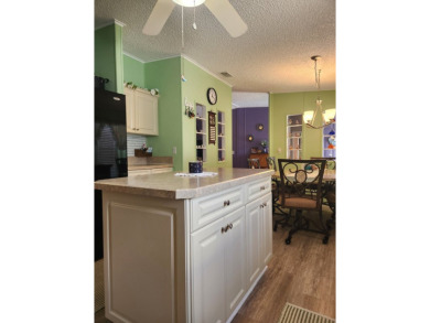 This beautiful 2-bedroom, 2-bath split-floor plan home is on Pine Lakes Country Club in Florida - for sale on GolfHomes.com, golf home, golf lot