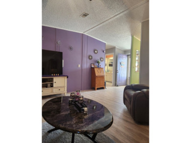 This beautiful 2-bedroom, 2-bath split-floor plan home is on Pine Lakes Country Club in Florida - for sale on GolfHomes.com, golf home, golf lot