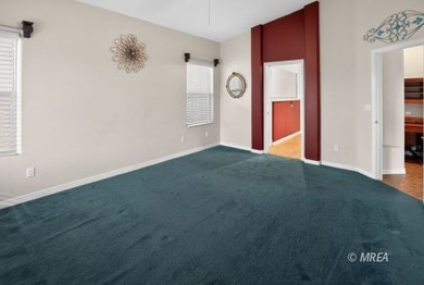 Welcome home to this inviting single-level residence located in on The Oasis Golf Club in Nevada - for sale on GolfHomes.com, golf home, golf lot