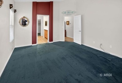 Welcome home to this inviting single-level residence located in on The Oasis Golf Club in Nevada - for sale on GolfHomes.com, golf home, golf lot