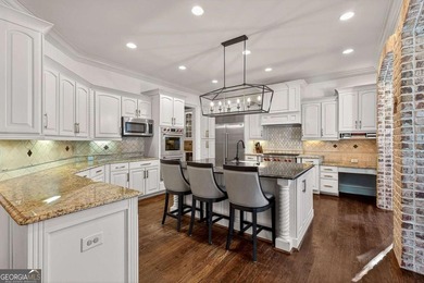 The moment you enter the private gates of Ardsley Park at on The Golf Club of Georgia in Georgia - for sale on GolfHomes.com, golf home, golf lot