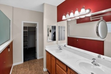 Welcome home to this inviting single-level residence located in on The Oasis Golf Club in Nevada - for sale on GolfHomes.com, golf home, golf lot