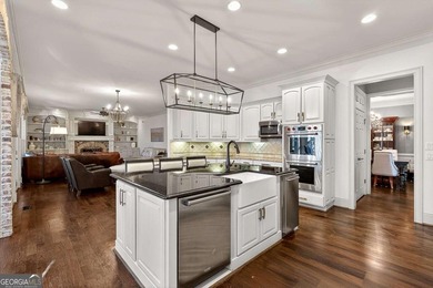 The moment you enter the private gates of Ardsley Park at on The Golf Club of Georgia in Georgia - for sale on GolfHomes.com, golf home, golf lot