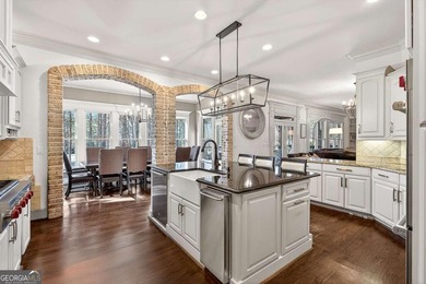 The moment you enter the private gates of Ardsley Park at on The Golf Club of Georgia in Georgia - for sale on GolfHomes.com, golf home, golf lot