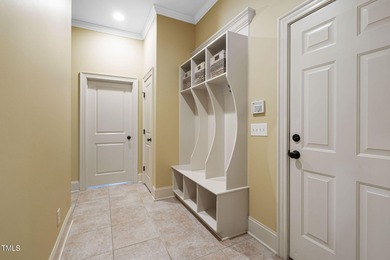 This stunning Heritage home built by Homes By Dickerson offers a on Heritage Golf Club in North Carolina - for sale on GolfHomes.com, golf home, golf lot