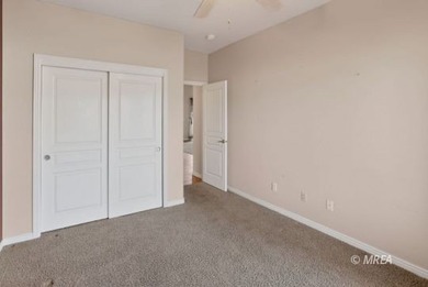 Welcome home to this inviting single-level residence located in on The Oasis Golf Club in Nevada - for sale on GolfHomes.com, golf home, golf lot