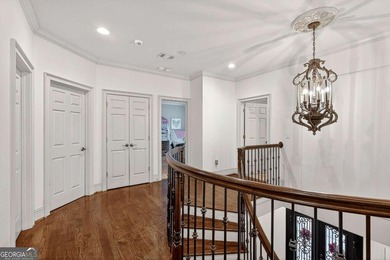 The moment you enter the private gates of Ardsley Park at on The Golf Club of Georgia in Georgia - for sale on GolfHomes.com, golf home, golf lot