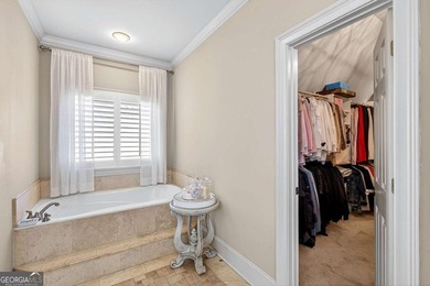 The moment you enter the private gates of Ardsley Park at on The Golf Club of Georgia in Georgia - for sale on GolfHomes.com, golf home, golf lot