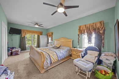 First time ever marketed in Cypress Landing! Custom home by on Cypress Landing Golf Club in North Carolina - for sale on GolfHomes.com, golf home, golf lot