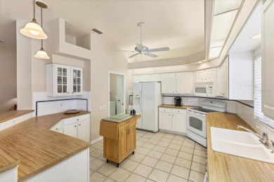 Don't miss out!!  Bright and cheery home with Southern exposure on Pelican Pointe Golf and Country Club in Florida - for sale on GolfHomes.com, golf home, golf lot