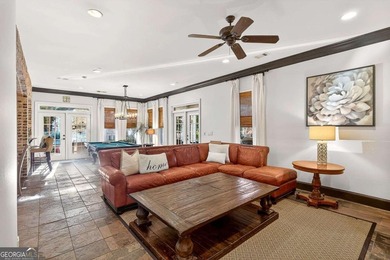 The moment you enter the private gates of Ardsley Park at on The Golf Club of Georgia in Georgia - for sale on GolfHomes.com, golf home, golf lot