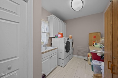 First time ever marketed in Cypress Landing! Custom home by on Cypress Landing Golf Club in North Carolina - for sale on GolfHomes.com, golf home, golf lot