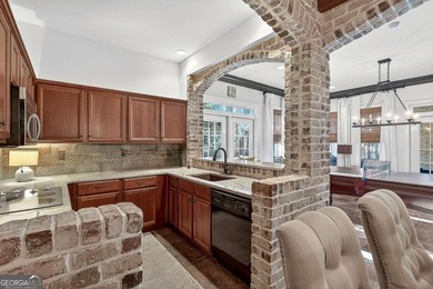 The moment you enter the private gates of Ardsley Park at on The Golf Club of Georgia in Georgia - for sale on GolfHomes.com, golf home, golf lot