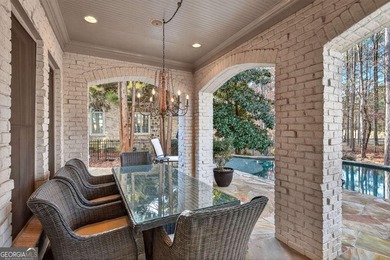 The moment you enter the private gates of Ardsley Park at on The Golf Club of Georgia in Georgia - for sale on GolfHomes.com, golf home, golf lot