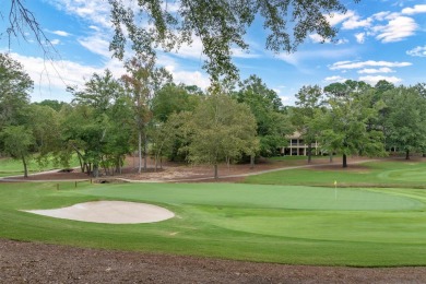 Perched above the green on the Jack Nicolas signature 5th hole on Great Waters Course At Reynolds Plantation in Georgia - for sale on GolfHomes.com, golf home, golf lot