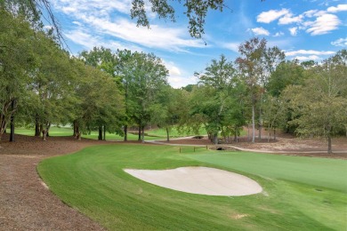 Perched above the green on the Jack Nicolas signature 5th hole on Great Waters Course At Reynolds Plantation in Georgia - for sale on GolfHomes.com, golf home, golf lot