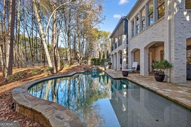 The moment you enter the private gates of Ardsley Park at on The Golf Club of Georgia in Georgia - for sale on GolfHomes.com, golf home, golf lot