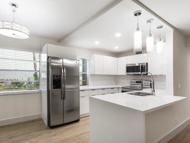 This beautifully updated condo features a stunning kitchen with on Kings Point Golf -Flanders Way in Florida - for sale on GolfHomes.com, golf home, golf lot