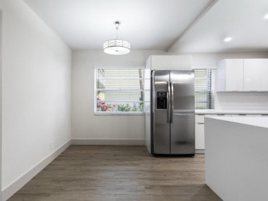 This beautifully updated condo features a stunning kitchen with on Kings Point Golf -Flanders Way in Florida - for sale on GolfHomes.com, golf home, golf lot