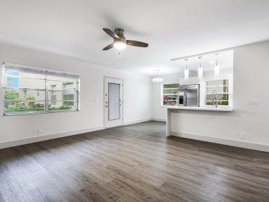 This beautifully updated condo features a stunning kitchen with on Kings Point Golf -Flanders Way in Florida - for sale on GolfHomes.com, golf home, golf lot