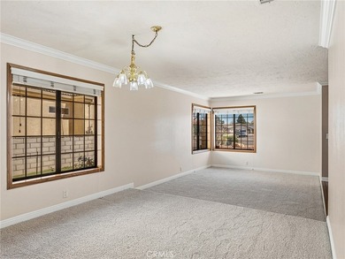 Welcome to this beautifully maintained home located at 12860 on Spring Valley Lake Country Club in California - for sale on GolfHomes.com, golf home, golf lot